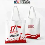 Totebag Custom Kemerdekaan dengan desain HUT Republik Indonesia untuk merchandise perusahaan, seminar, dan event dari BU Digital Printing.